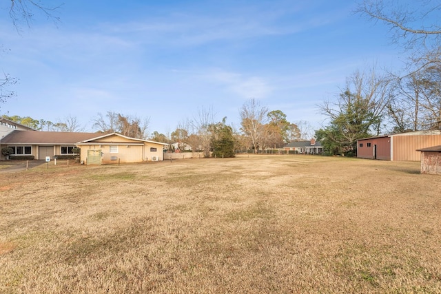 2054 John D Odom Rd, Dothan, AL 36303 - view of yard featuring an outbuilding and a pole building