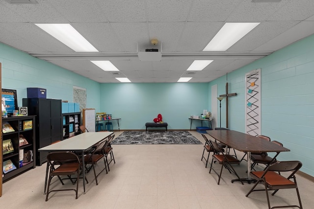 2054 John D Odom Rd, Dothan, AL 36303 - recreation room featuring a drop ceiling and concrete block wall
