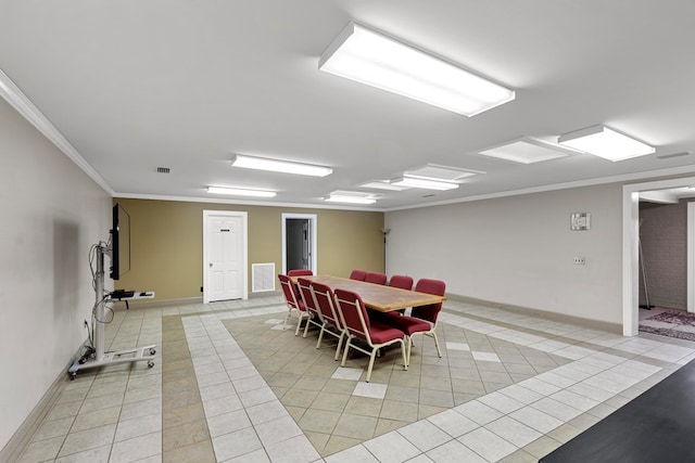 2054 John D Odom Rd, Dothan, AL 36303 - dining area with light tile patterned flooring, baseboards, and ornamental molding
