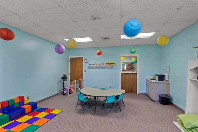 2054 John D Odom Rd, Dothan, AL 36303 - recreation room with carpet, a paneled ceiling, and baseboards