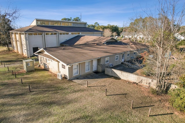 2054 John D Odom Rd, Dothan, AL 36303 - rear view of property with roof with shingles and driveway