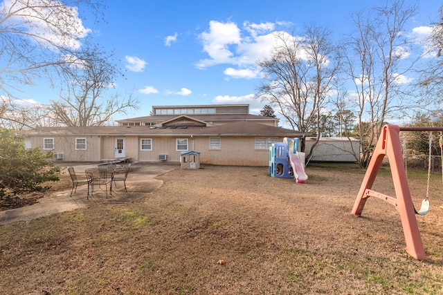 2054 John D Odom Rd, Dothan, AL 36303 - back of property with a playground and a patio area