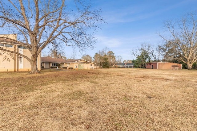 2054 John D Odom Rd, Dothan, AL 36303 - view of green lawn featuring an outdoor structure