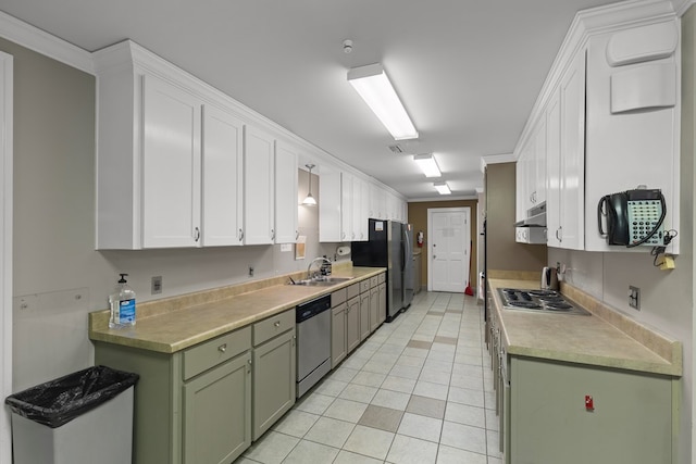 2054 John D Odom Rd, Dothan, AL 36303 - kitchen with appliances with stainless steel finishes, green cabinetry, a sink, white cabinets, and light tile patterned floors