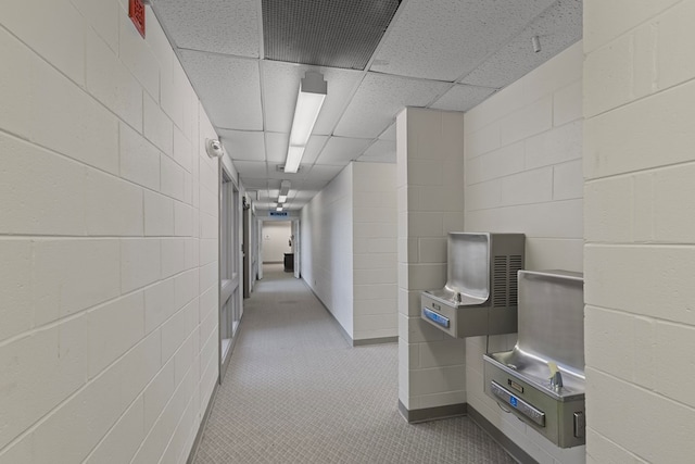 2054 John D Odom Rd, Dothan, AL 36303 - corridor featuring concrete block wall and a paneled ceiling