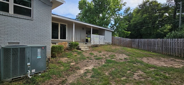 view of yard featuring central AC