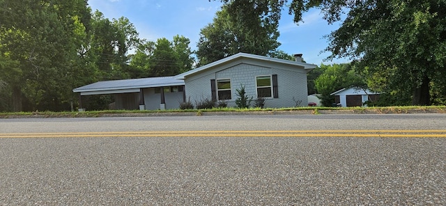 view of front of house with a carport