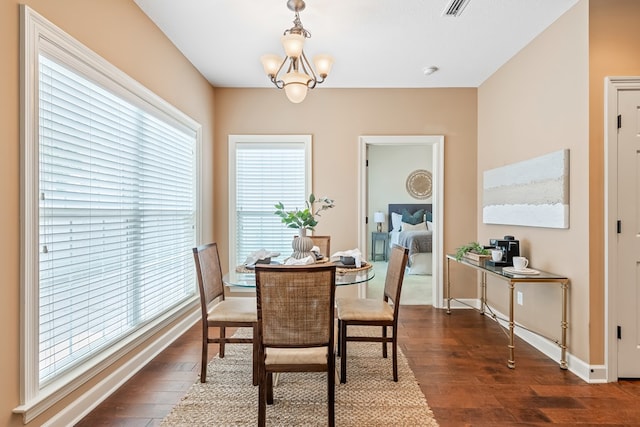 328 Hidden Creek Cir, Dothan, AL 36301 - dining area featuring plenty of natural light, dark wood-style flooring, and a chandelier