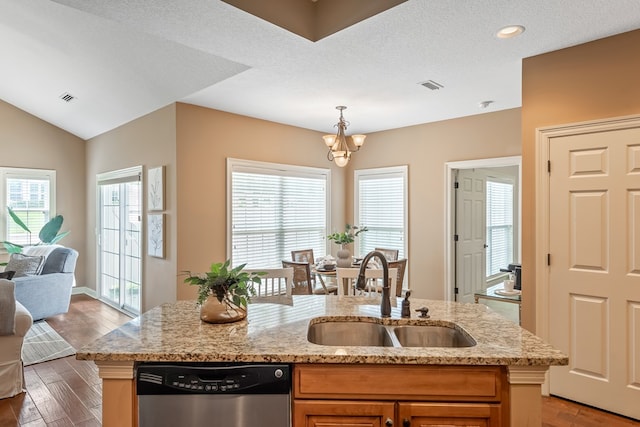 328 Hidden Creek Cir, Dothan, AL 36301 - kitchen featuring stainless steel dishwasher, open floor plan, a chandelier, light stone counters, and hanging light fixtures