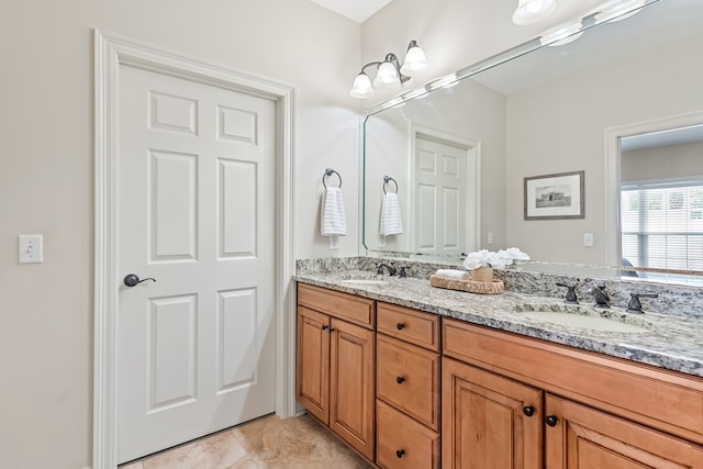 328 Hidden Creek Cir, Dothan, AL 36301 - bathroom featuring double vanity and tile patterned floors
