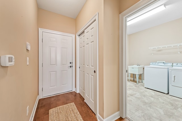 328 Hidden Creek Cir, Dothan, AL 36301 - doorway featuring separate washer and dryer and wood finished floors