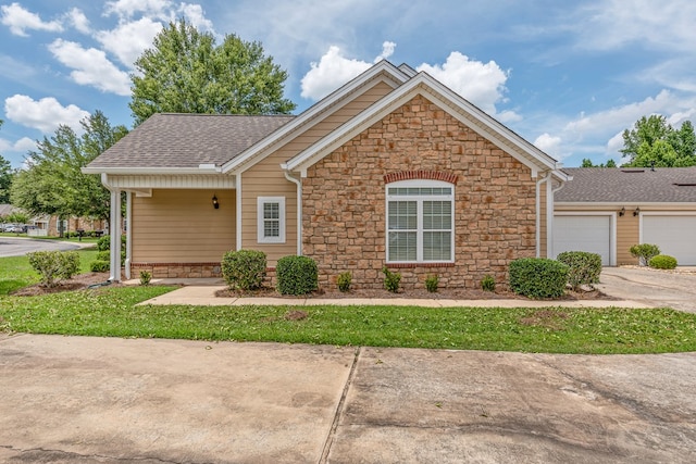 328 Hidden Creek Cir, Dothan, AL 36301 - ranch-style home featuring stone siding, a shingled roof, a garage, and concrete driveway