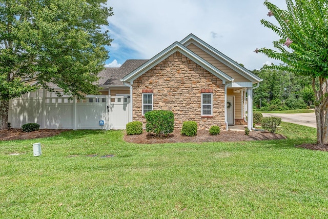 328 Hidden Creek Cir, Dothan, AL 36301 - view of front of house featuring stone siding and roof with shingles