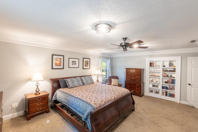 carpeted bedroom with ceiling fan, crown molding, and a textured ceiling