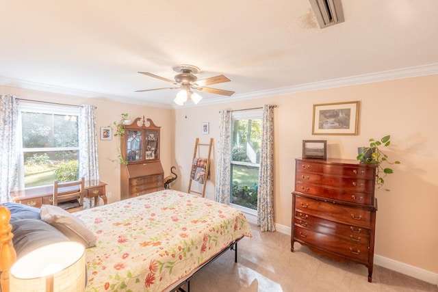 bedroom with light carpet, ceiling fan, and ornamental molding