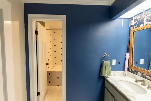 bathroom with tile patterned flooring and vanity