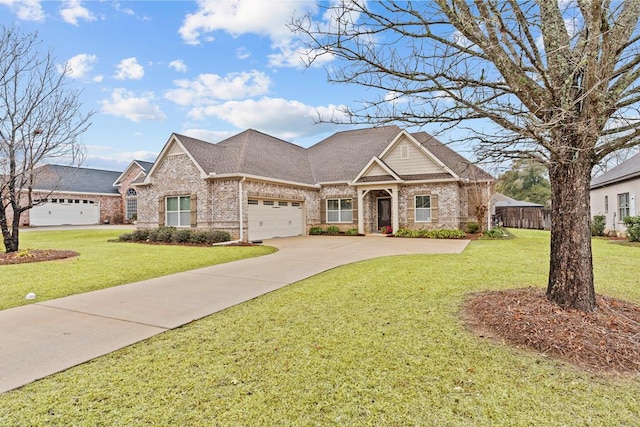 craftsman inspired home with a front yard and a garage