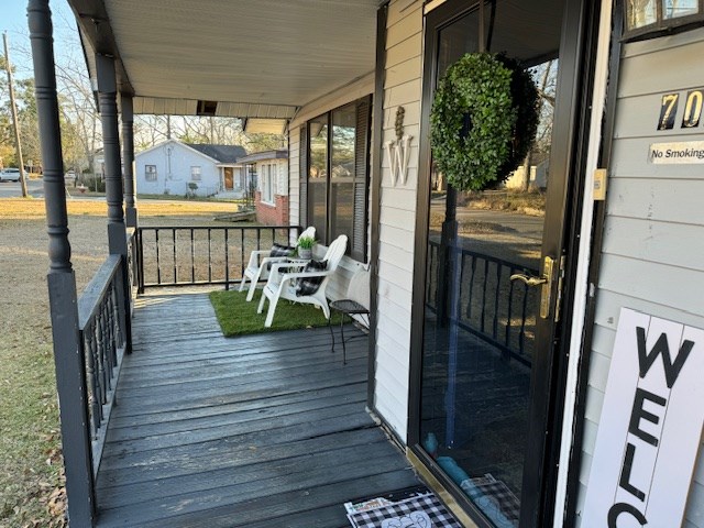 wooden deck with a porch