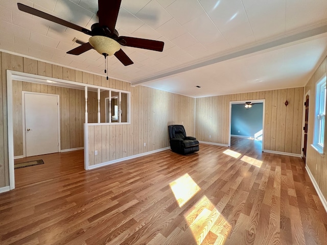 unfurnished room featuring wood-type flooring and ceiling fan