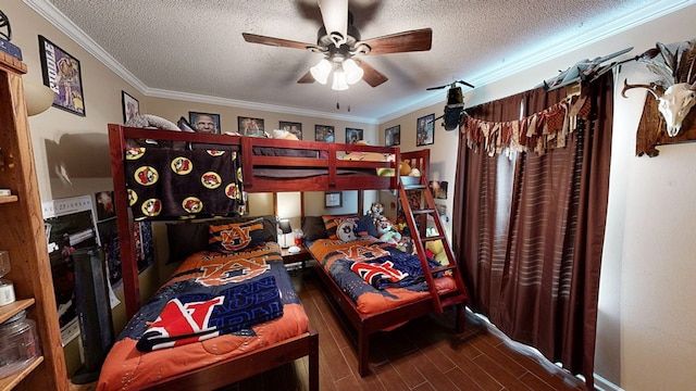 bedroom with hardwood / wood-style floors, crown molding, a textured ceiling, and ceiling fan