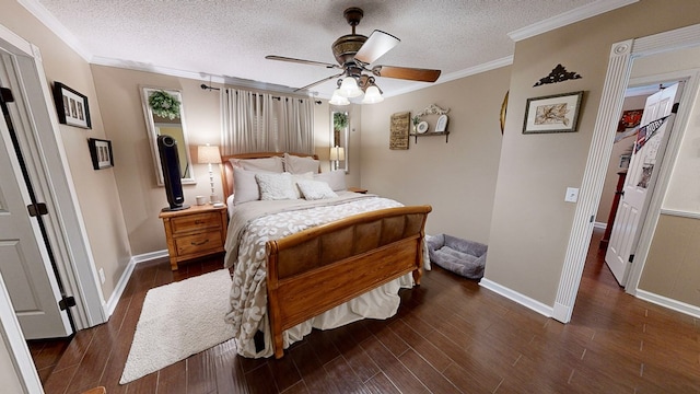 bedroom with dark wood-type flooring, ornamental molding, and a textured ceiling