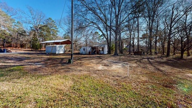 view of yard featuring a carport