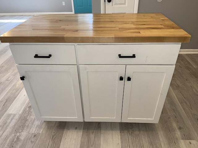 471 Faith St, Enterprise, AL 36330 - detailed view of wood finished floors and baseboards