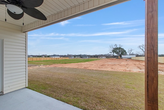 view of yard featuring ceiling fan