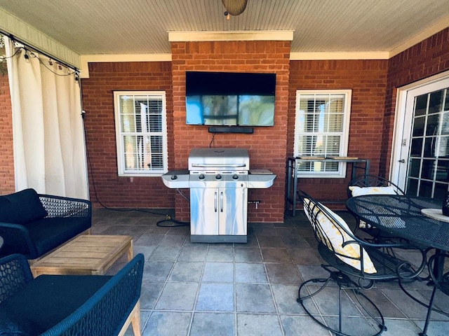 view of patio / terrace with outdoor lounge area, ceiling fan, and area for grilling