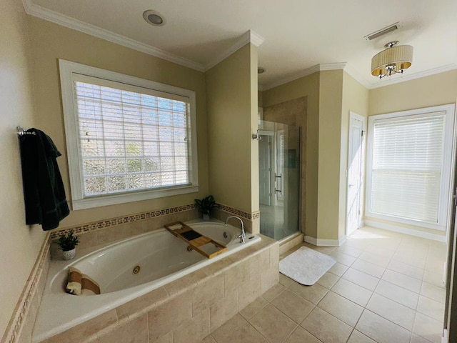 bathroom with tile patterned floors, ornamental molding, and independent shower and bath