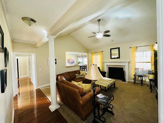 living room featuring ceiling fan, a healthy amount of sunlight, vaulted ceiling, and hardwood / wood-style flooring