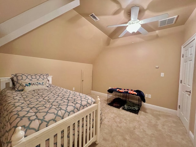 bedroom featuring carpet, vaulted ceiling, and ceiling fan