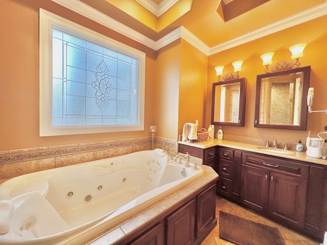 bathroom with vanity, a bathtub, and crown molding