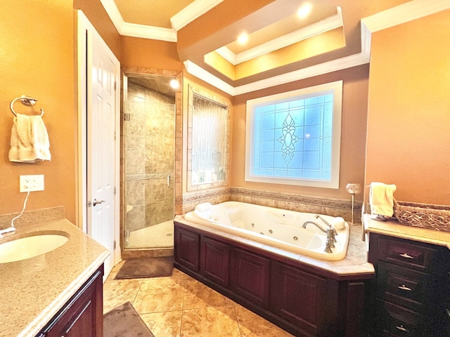 bathroom with plus walk in shower, vanity, and ornamental molding