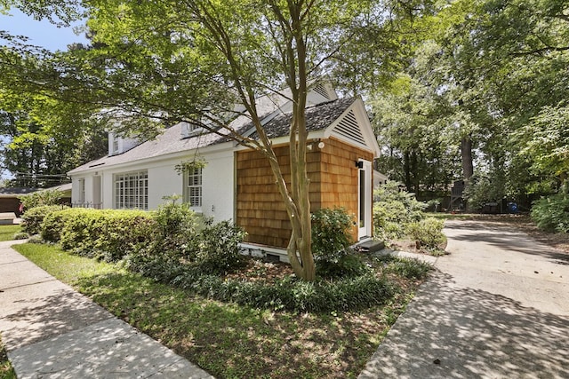 121 N Roberta Ave, Dothan, AL 36303 - view of property exterior with concrete driveway and roof with shingles