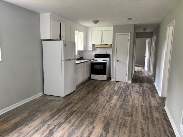 195 Donnie Mae Dr, Dothan, AL 36301 - kitchen featuring white appliances, under cabinet range hood, dark wood-type flooring, white cabinetry, and backsplash