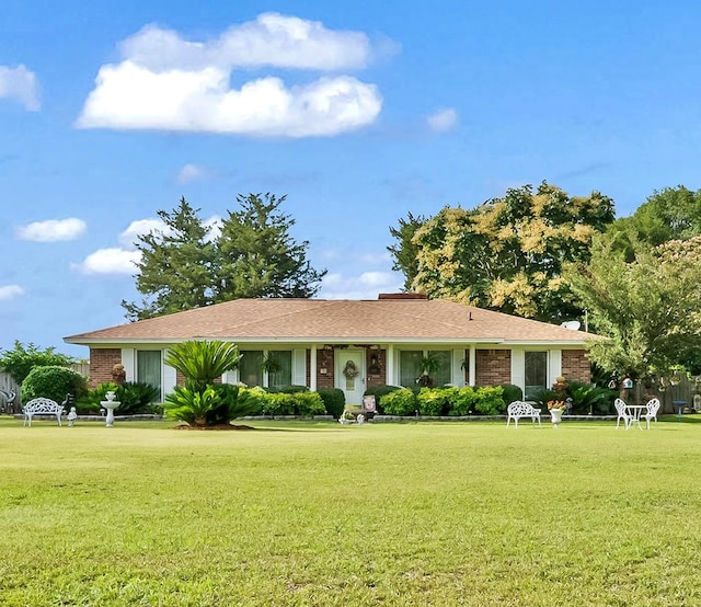 13215 E State Highway 52, Hartford, AL 36344 - single story home with a front yard and brick siding
