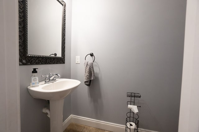 bathroom featuring baseboards