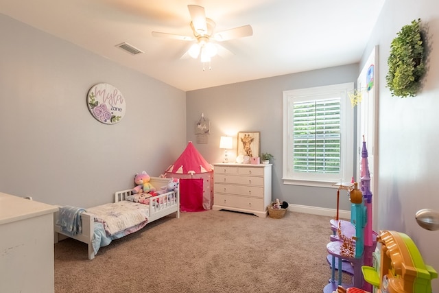 bedroom with visible vents, a ceiling fan, baseboards, and carpet floors