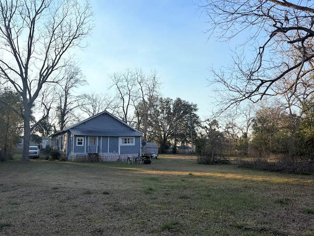 exterior space with a yard