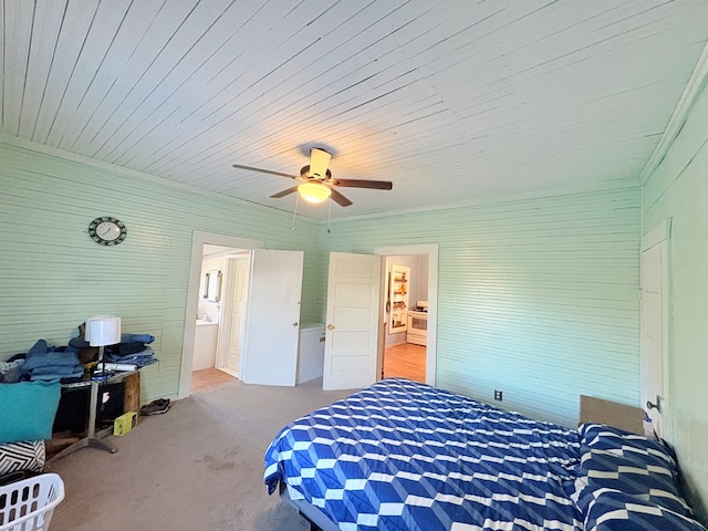 carpeted bedroom with a ceiling fan and crown molding