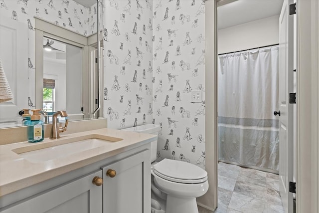 full bath featuring toilet, wallpapered walls, a shower with curtain, and vanity