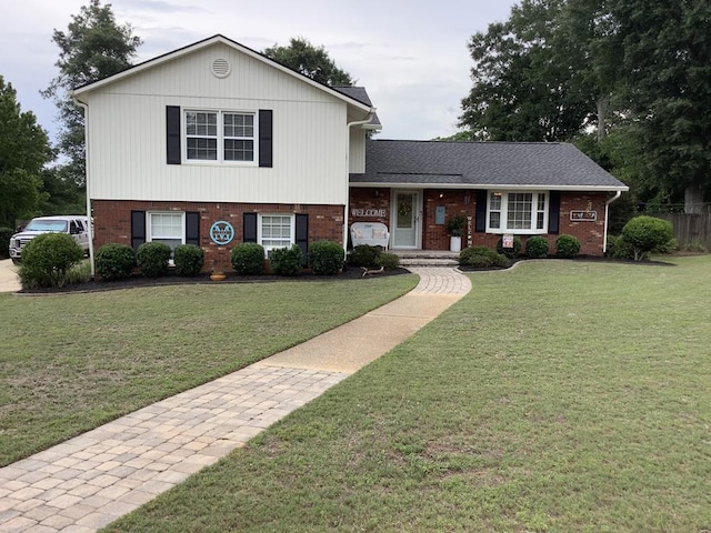 210 E Hickory Bend Rd, Enterprise, AL 36330 - split level home featuring brick siding and a front yard