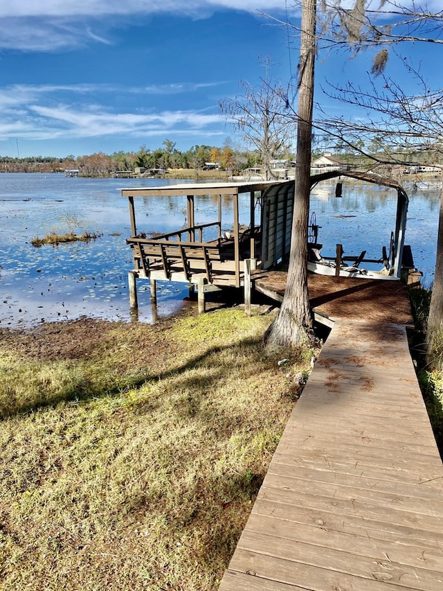 view of dock with a water view