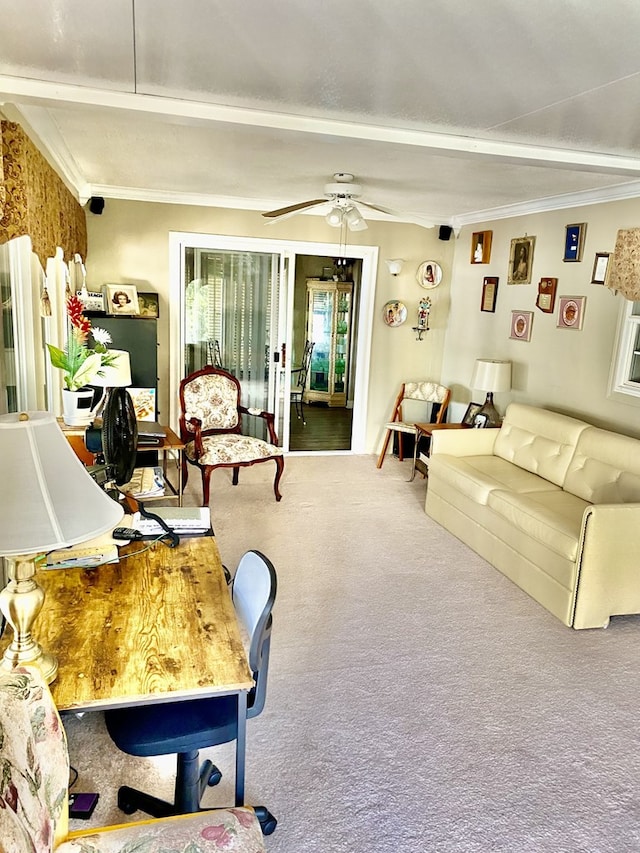 living room featuring carpet floors, crown molding, and ceiling fan