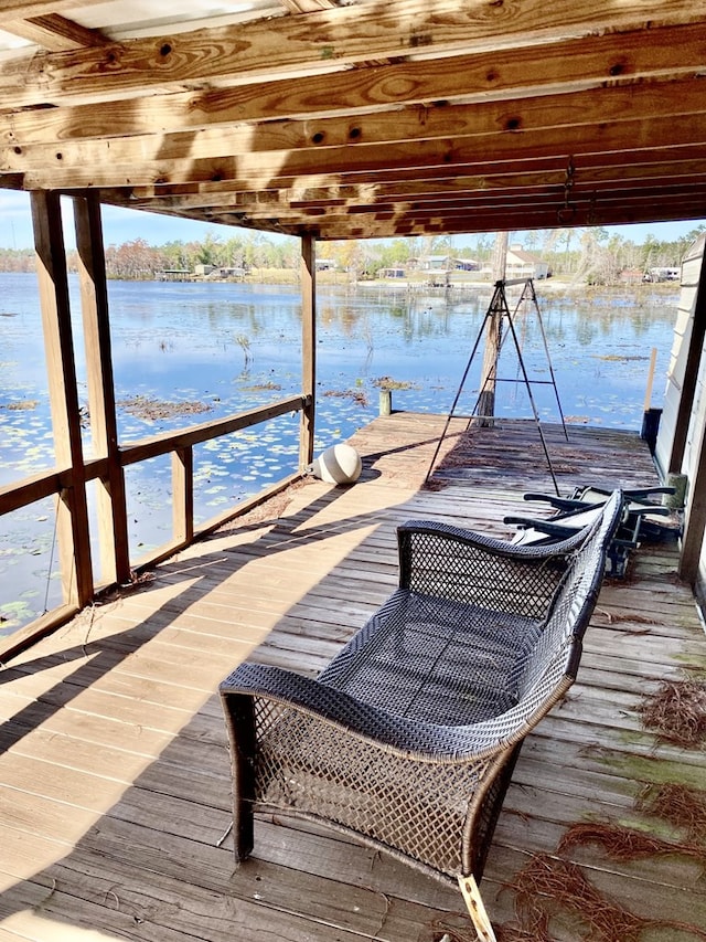 dock area featuring a water view