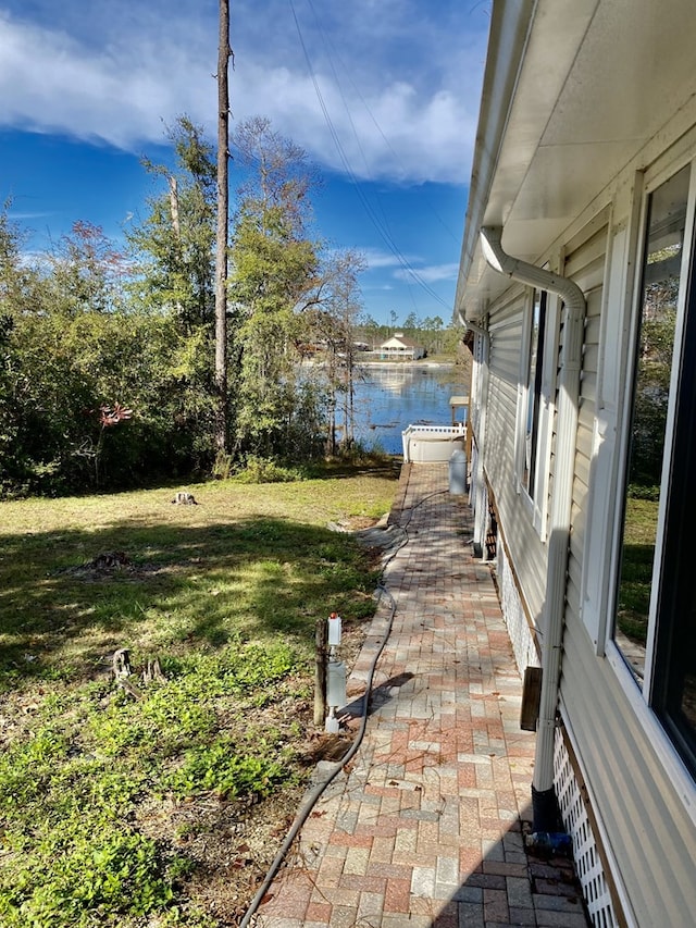 view of yard with a water view