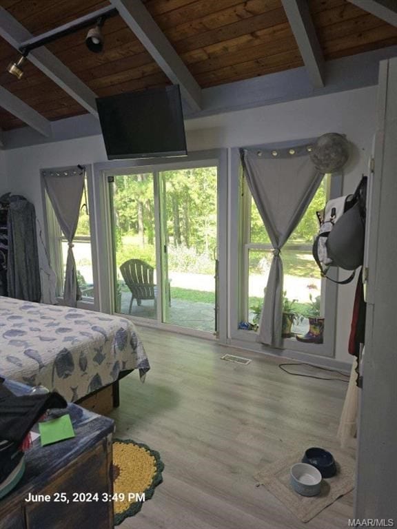 1442 Jernigan Rd, Ozark, AL 36360 - bedroom with wood ceiling, access to exterior, and wood finished floors