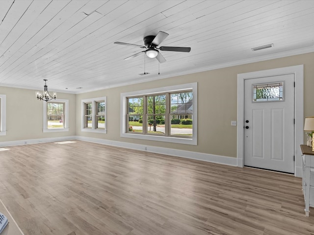 203 E Mckinnon St, New Brockton, AL 36351 - unfurnished living room with crown molding, a chandelier, plenty of natural light, light wood finished floors, and a ceiling fan