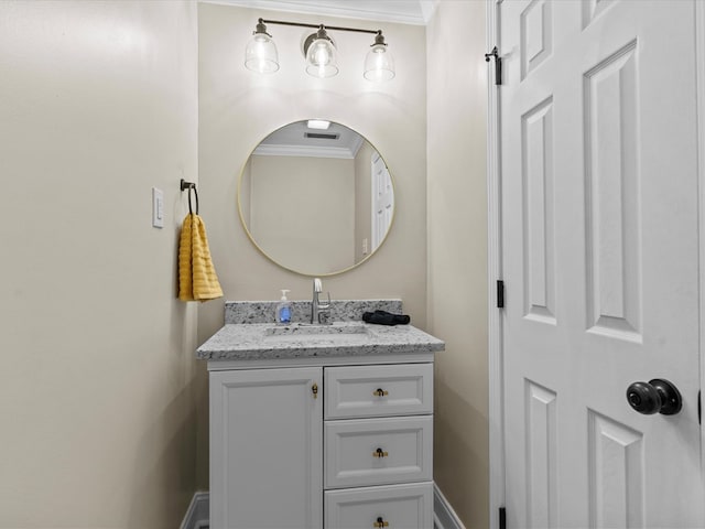 203 E Mckinnon St, New Brockton, AL 36351 - bathroom with crown molding and vanity